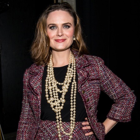 Emily Deschanel wearing fancy clothes.